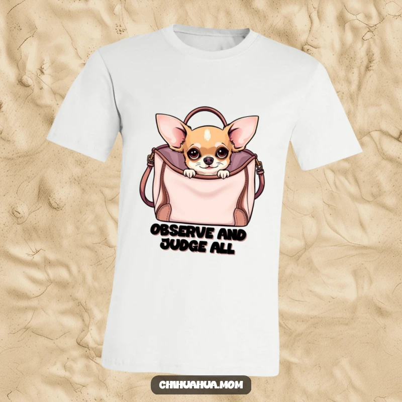 Funny Curious Chihuahua T-Shirt featuring a chihuahua peeking from a stylish handbag, exuding funny curiosity and fashionable flair.